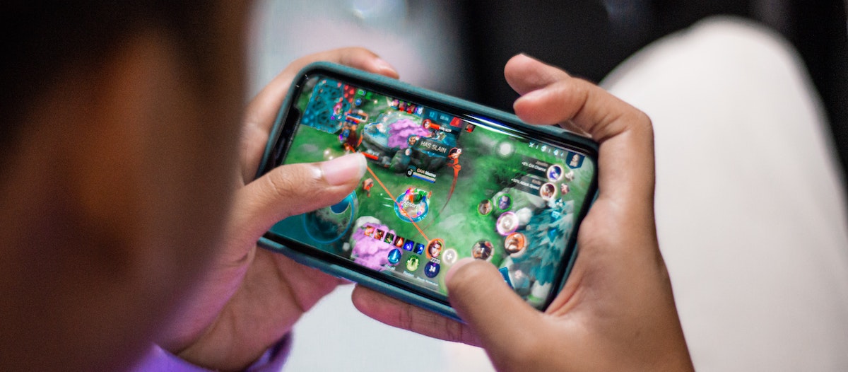 Man playing mobile game